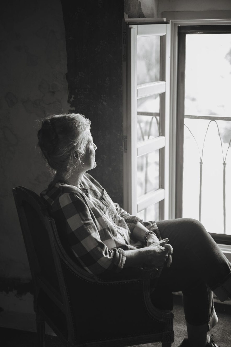 By the window, in black and white