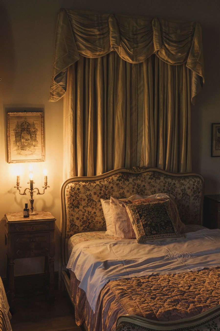 A bedroom by candlelight