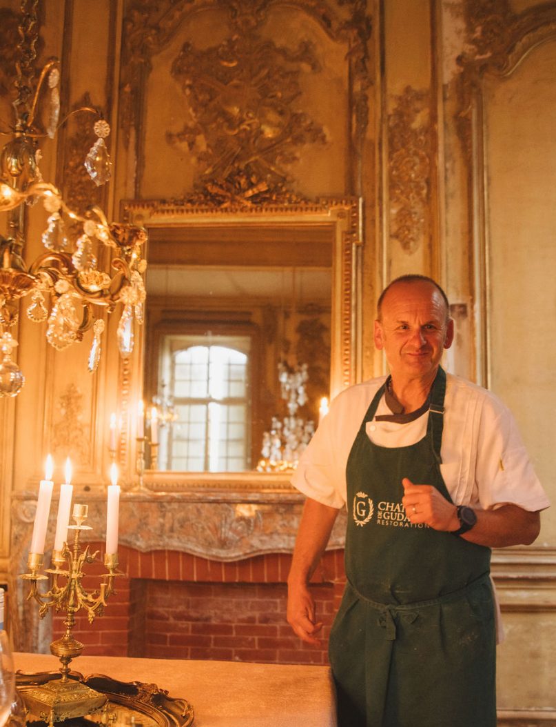 The chef in the candlelit salon
