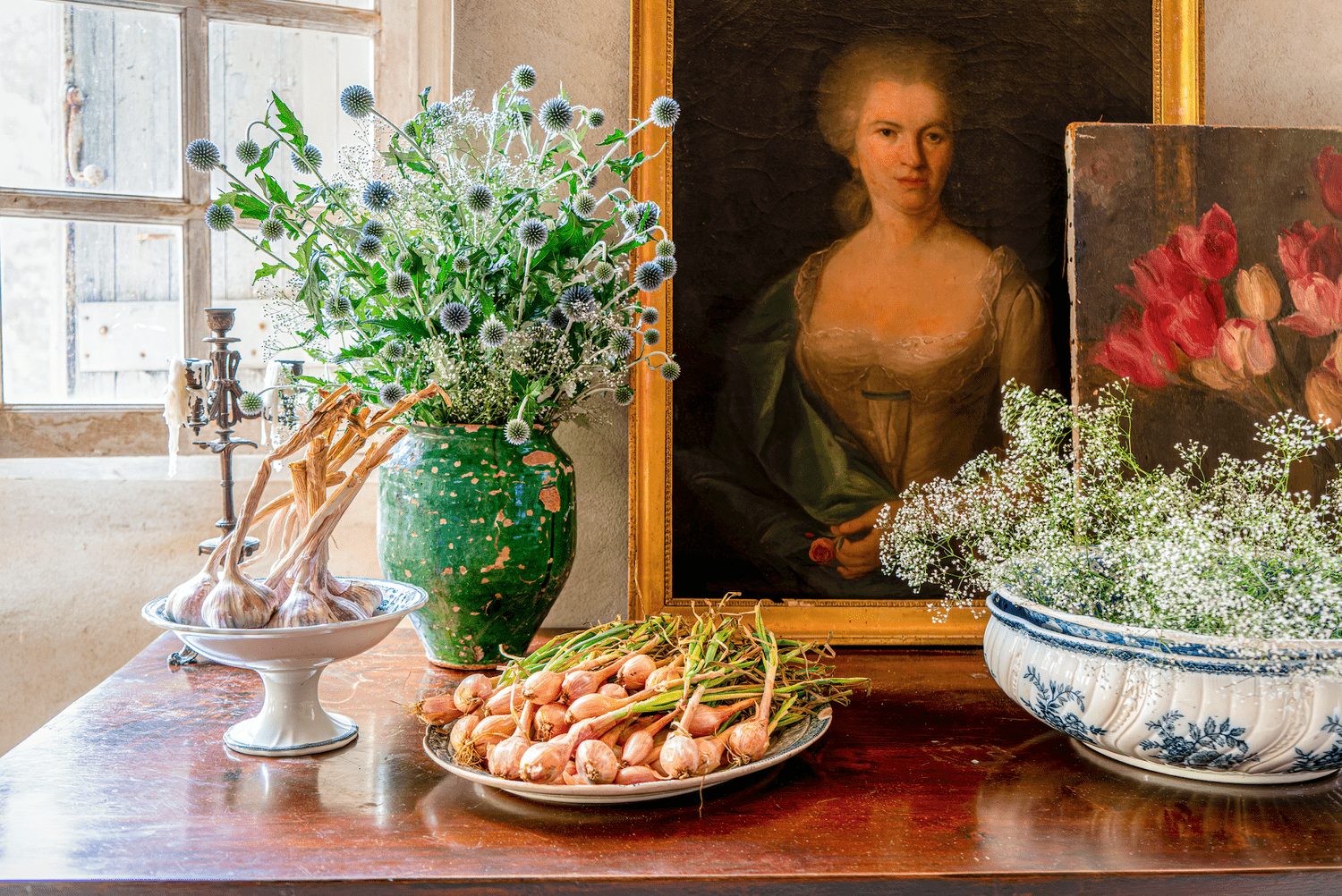 Flowers and an old portrait