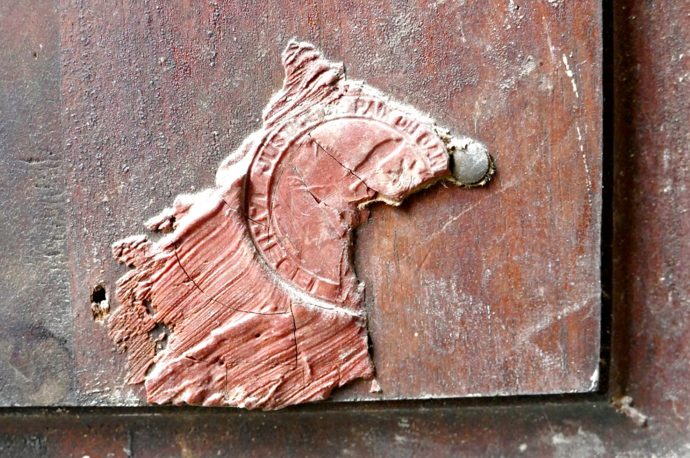 A carved relief, found in the château
