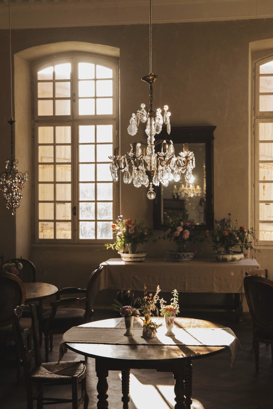 A salon, the chandelier lit