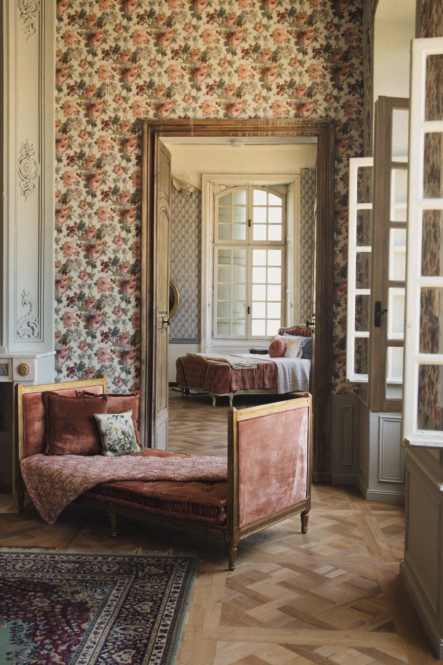 The floral bedroom of the Family Suite, from the window
