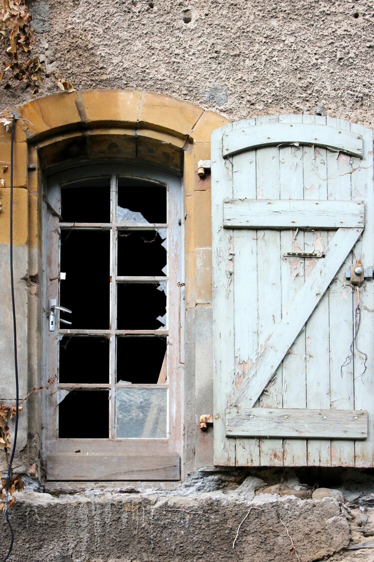 The windows before the work, the panes broken