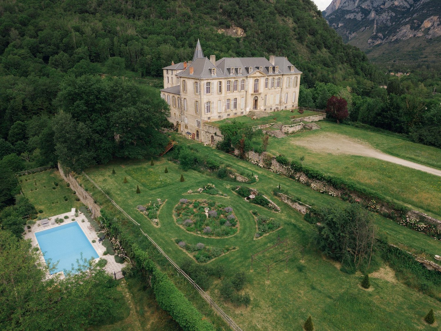 The château from above, with the pool and the grounds