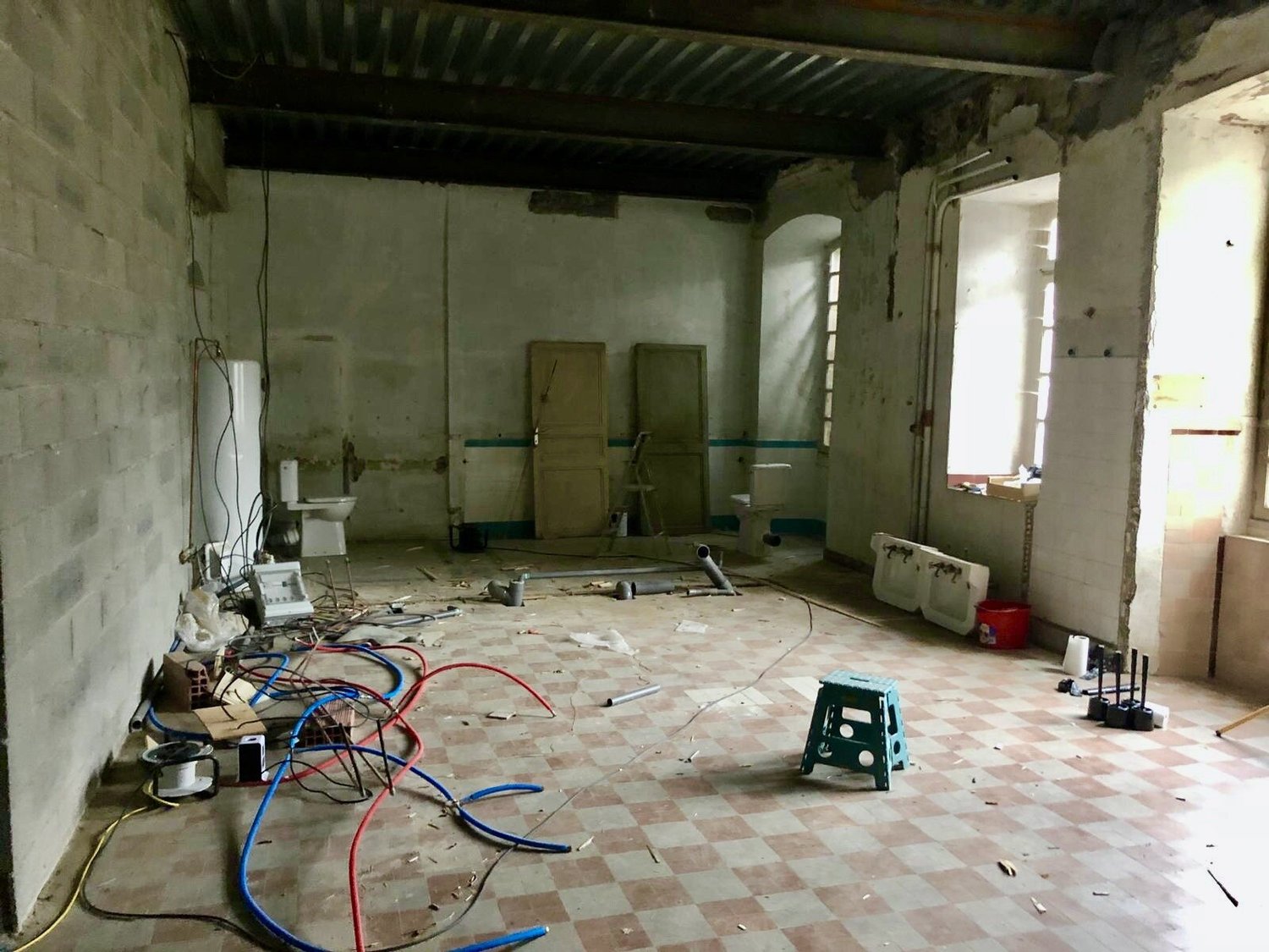 The room that became the bathrooms, as the 1970s holiday camp left it