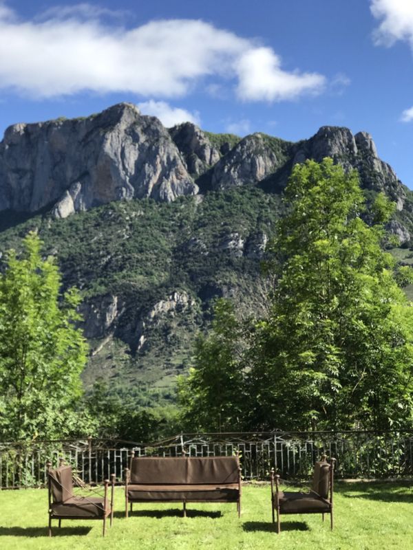 A garden sofa facing the mountains