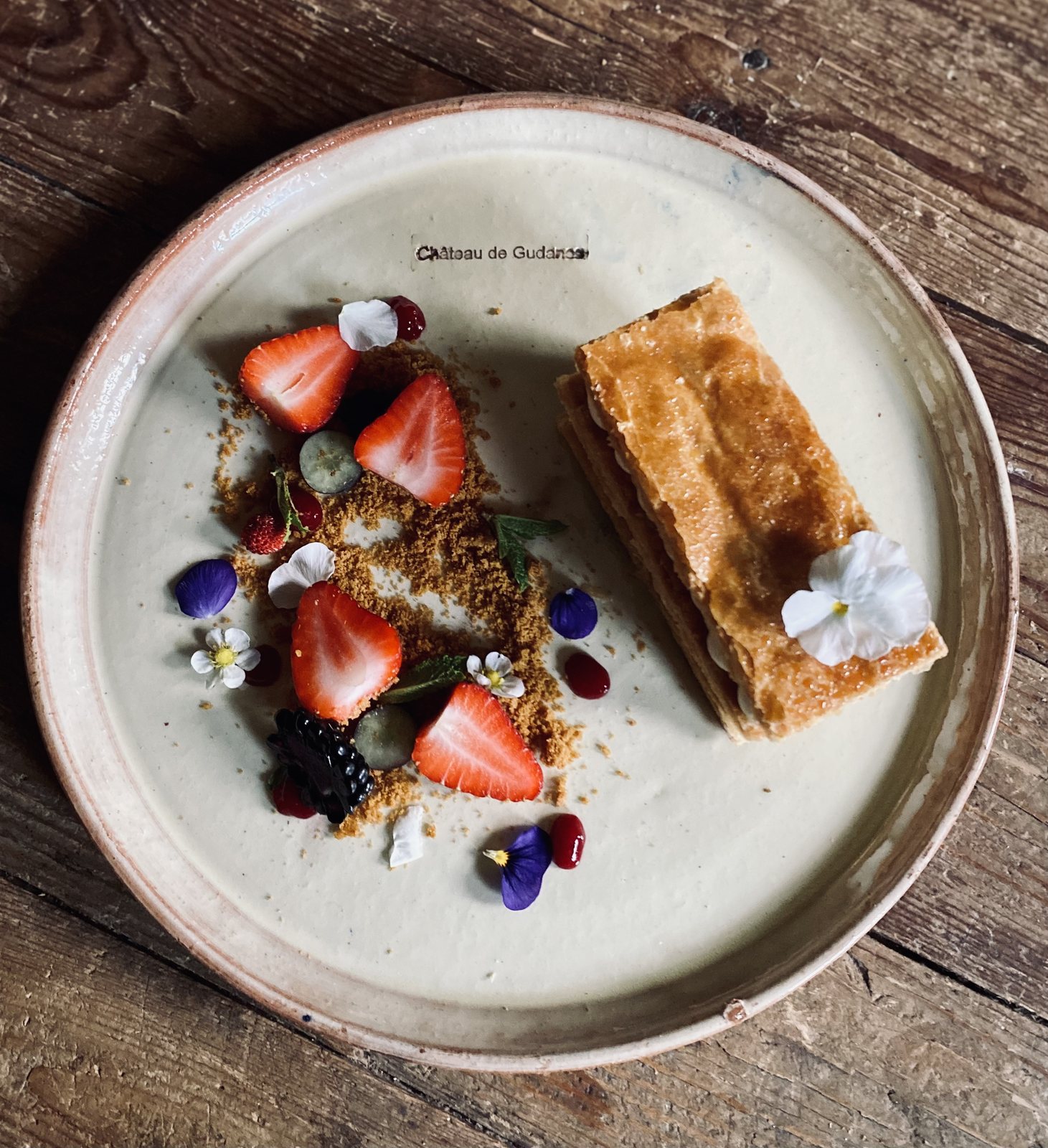 Strawberries, a tart and edible flowers