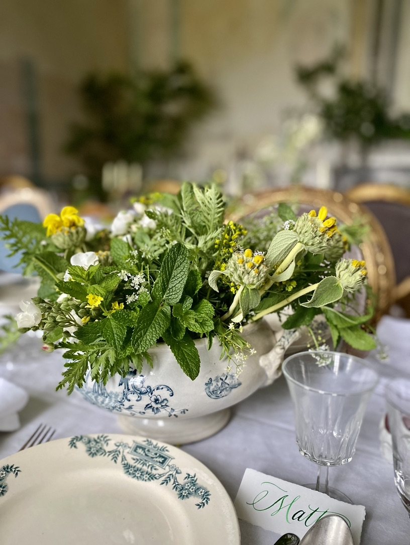 Herbs and flowers in an old tureen