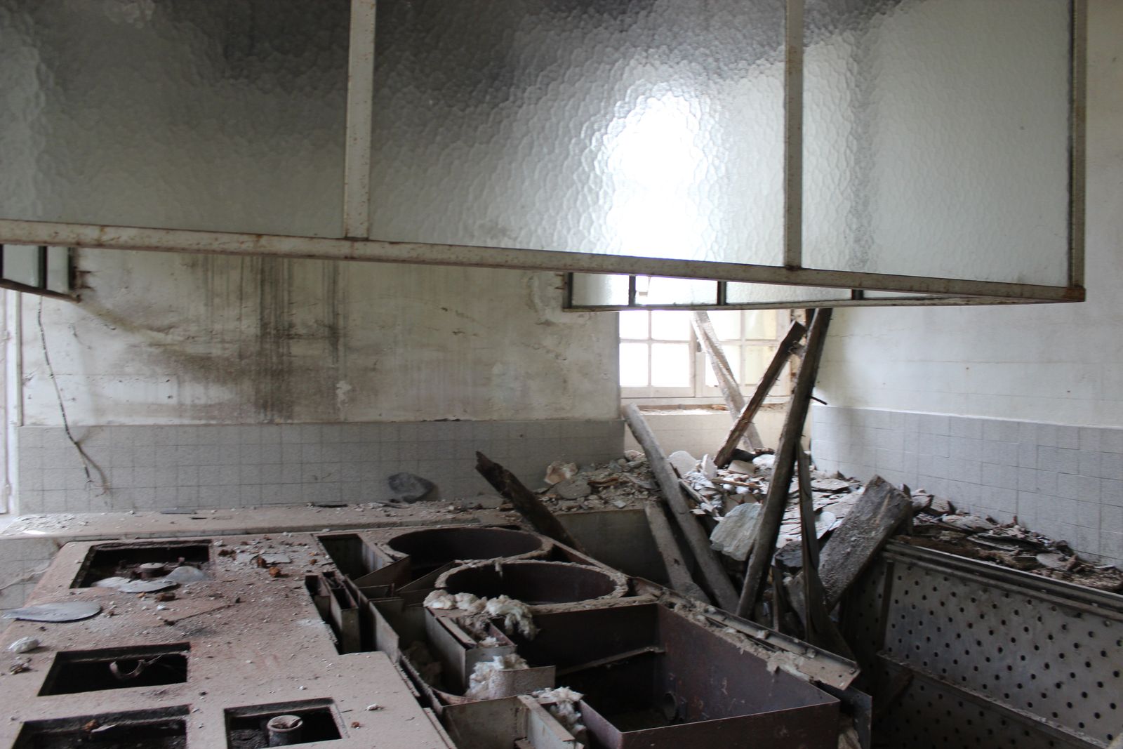 The holiday-camp kitchen, as it was left