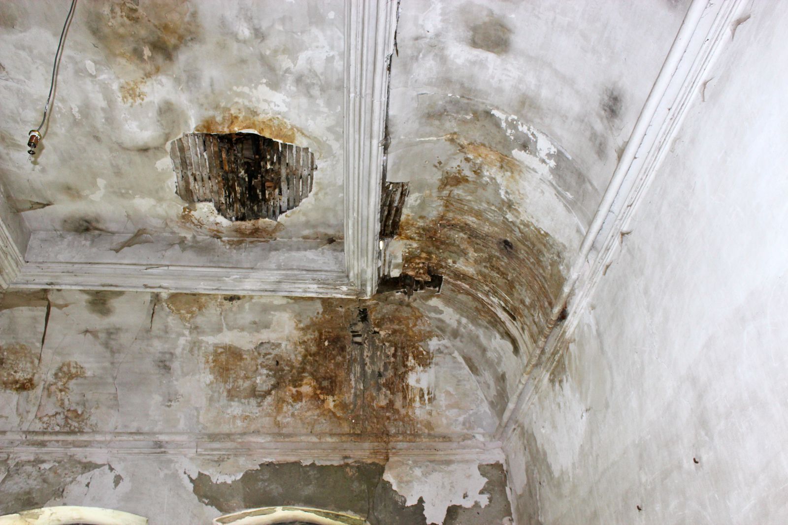A ceiling, where the rain came in