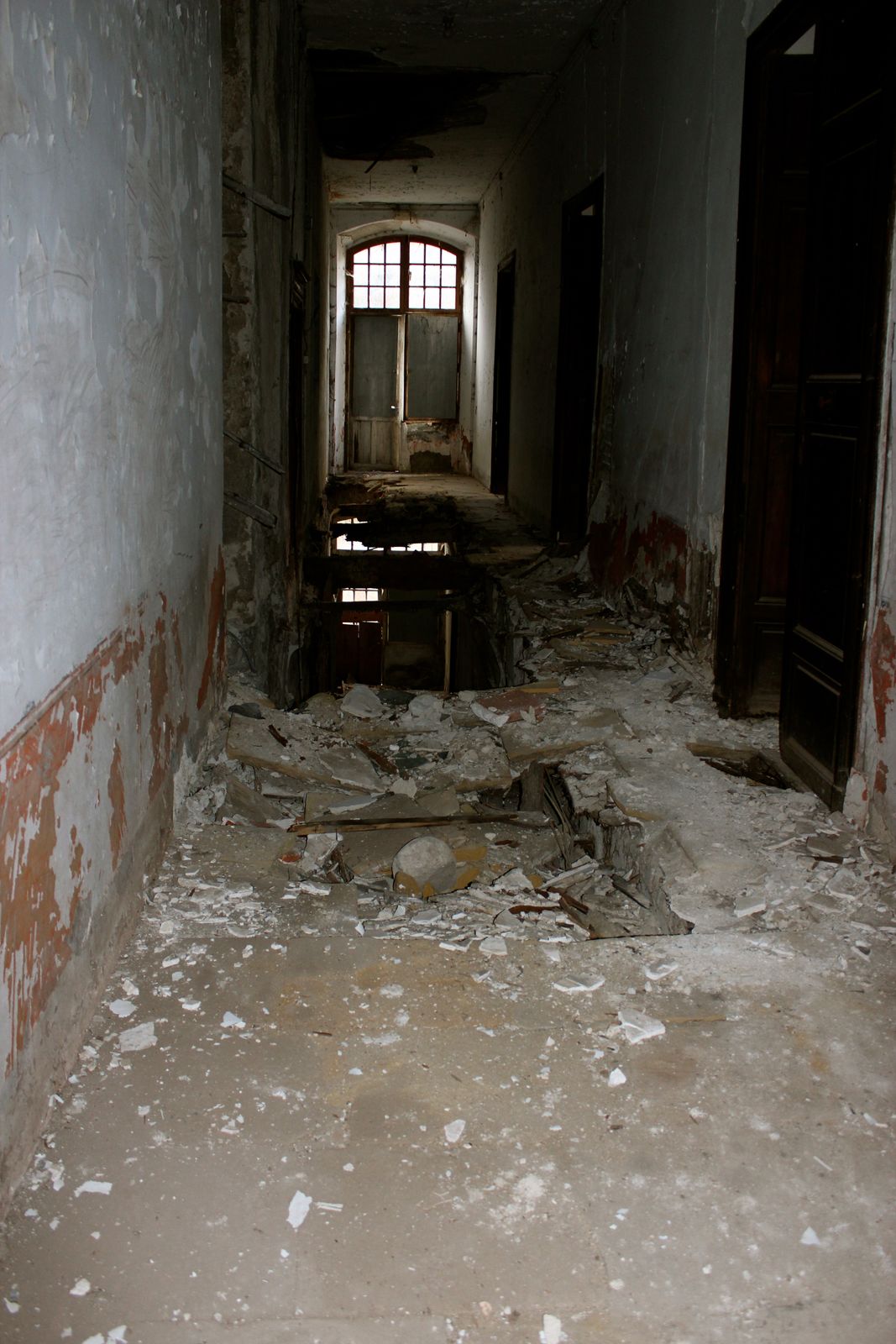 A corridor, its floor breaking through