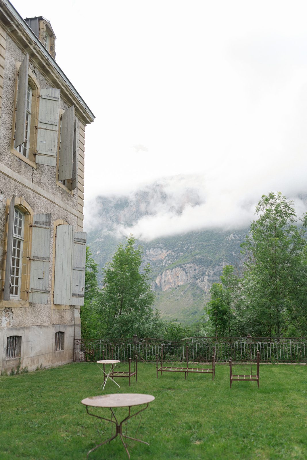 A corner of the château, mist on the hills