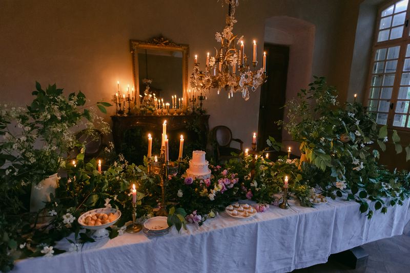 The dessert table under the chandelier