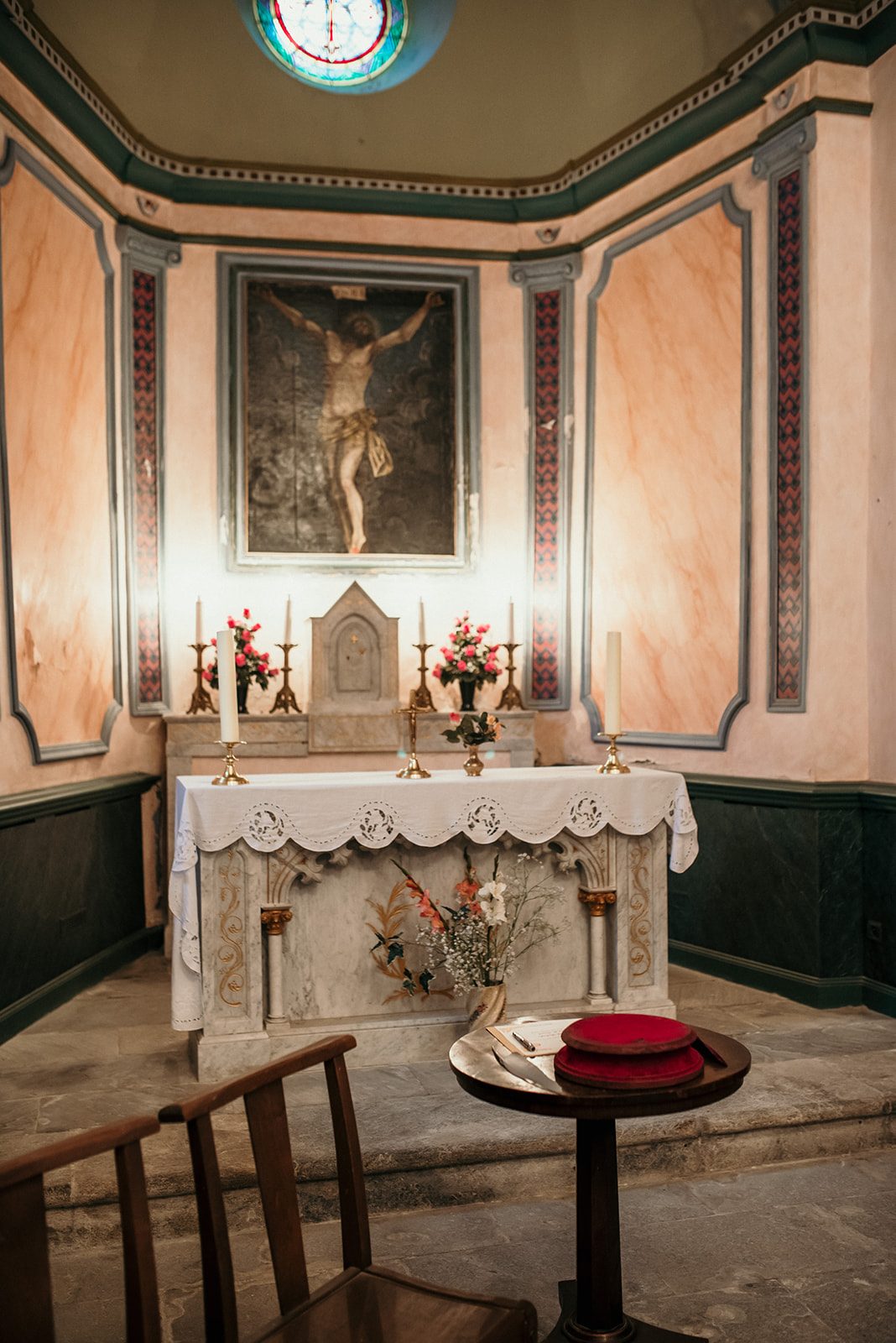 The altar of the local church, candles lit