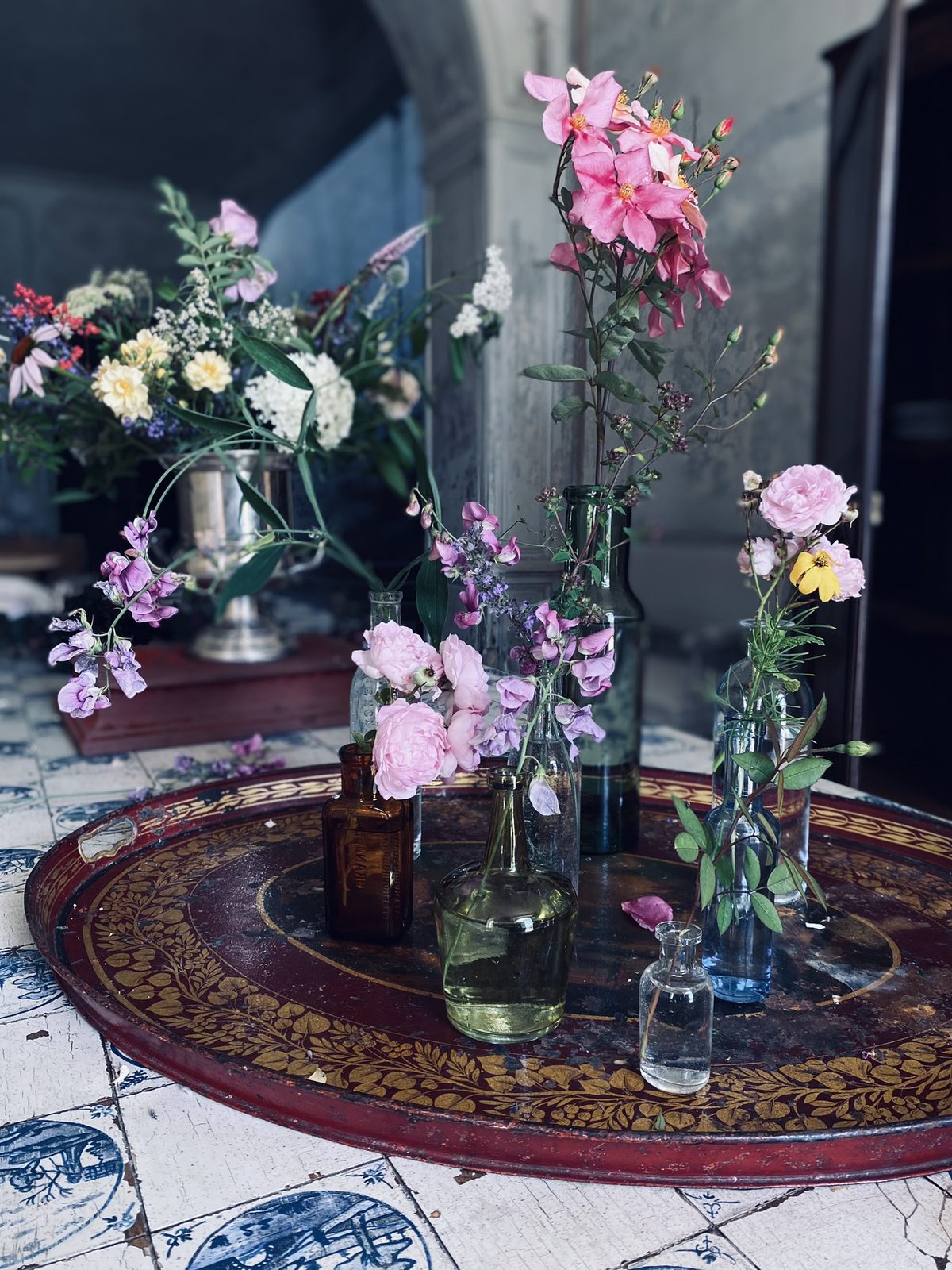 Flowers on a round table in the hall